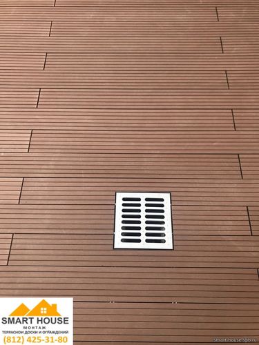 Террасная доска Террапол Орех Милано на балконе