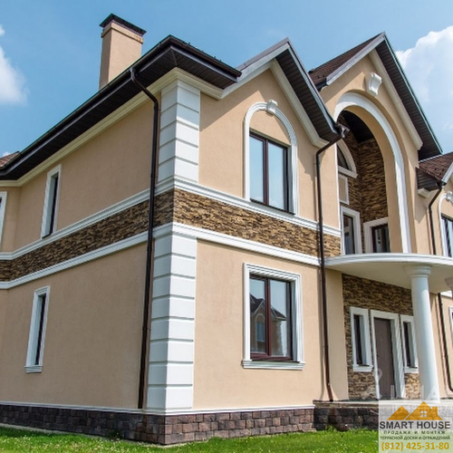 Устройство мокрого фасада на коттедже