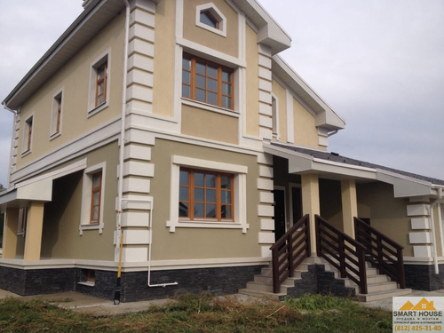 Устройство мокрого фасада на коттедже