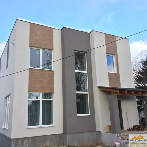 Устройство мокрого фасада на коттедже