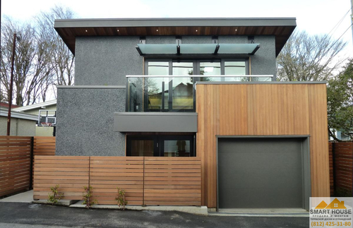 Устройство мокрого фасада на коттедже