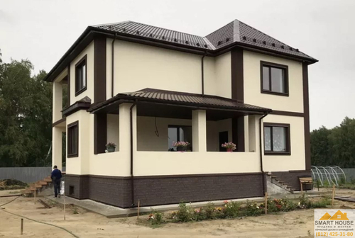 Устройство мокрого фасада на коттедже