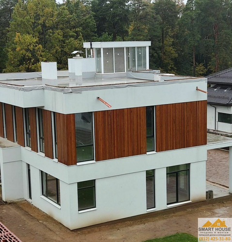 Устройство мокрого фасада на коттедже